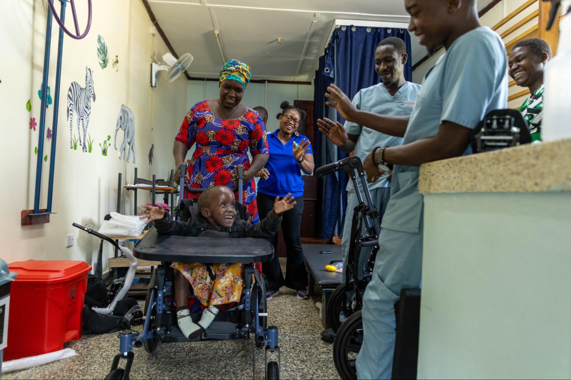 The team from Joni and Friends trained CURE Uganda’s Physiotherapy Team to custom-fit the wheelchairs for each child.