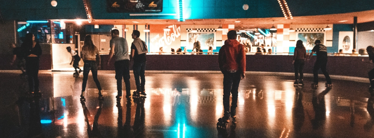 People at an indoor skating rink