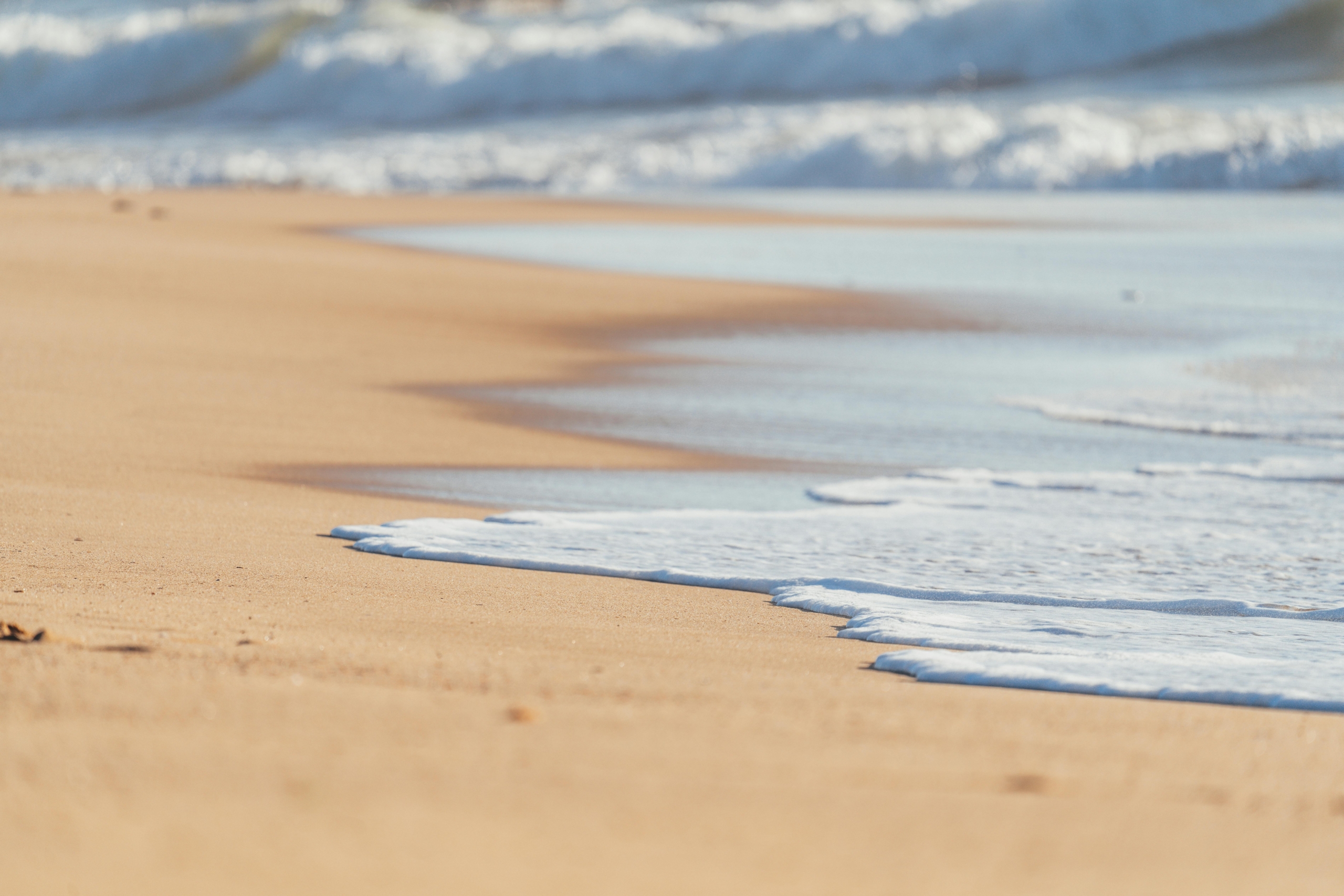 Waves lapping onto shore
