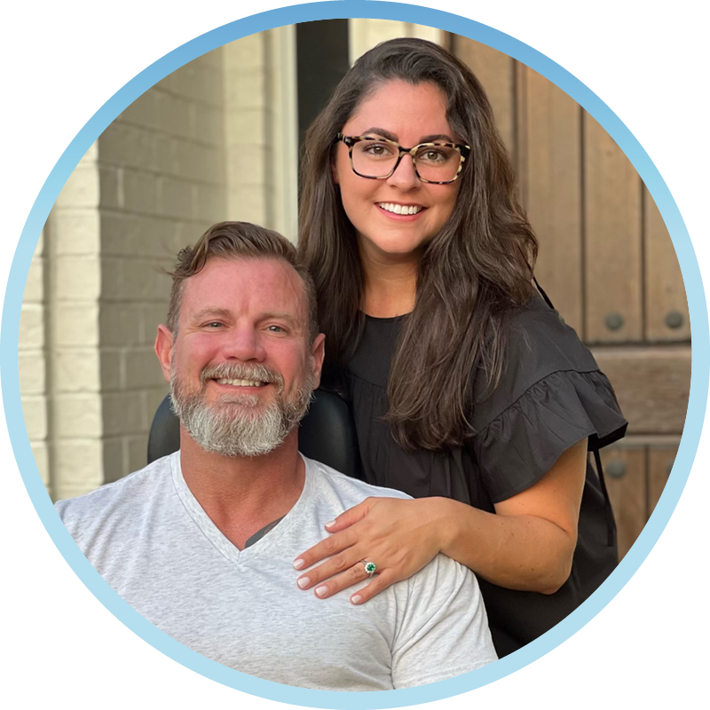 Mary Grace Burkey and Chad both are smiling and posing for the camera.