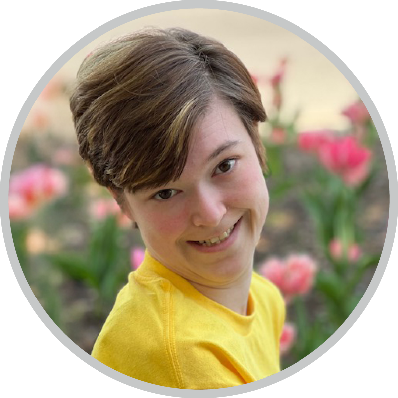 A headshot of Abigail Brown smiling for the camera.