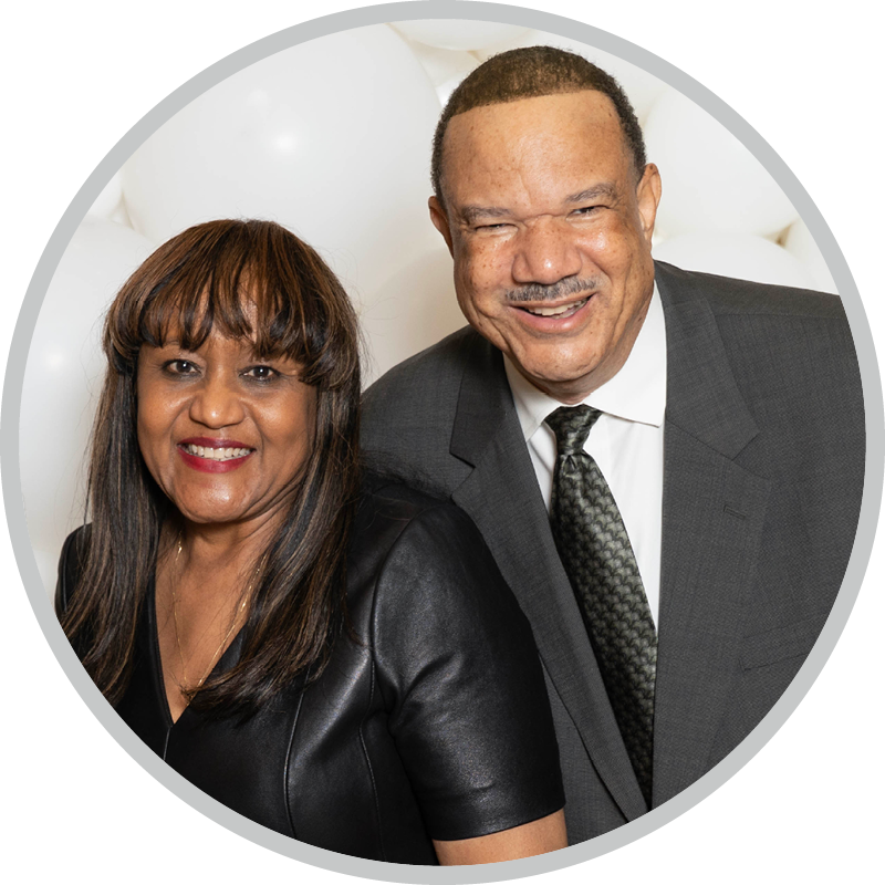 Joy Clifton and Lorraine Marshall both are smiling and posing for the camera.