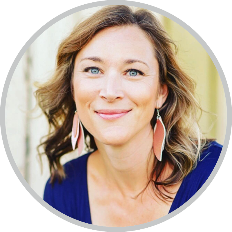 A headshot of Jess Ronne smiling for the camera.