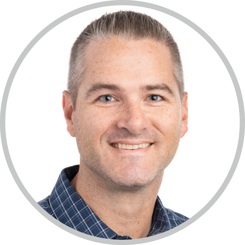 A headshot of Randy Schwartz smilng for the camera.