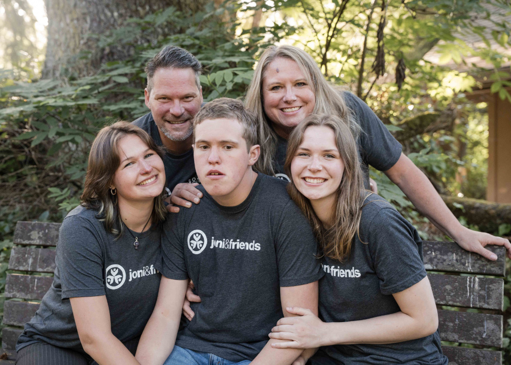 A family poses for a photo at Family Retreat