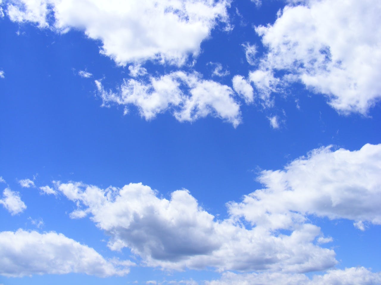 Fluffy clouds in the sky.