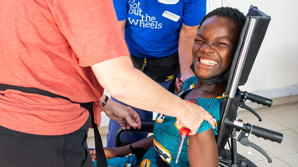 A girl smiles for the camera