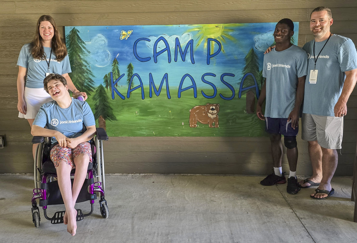 Smiles all around! Asher, his parents David and Mikaela, and his sister Rebekah enjoying family photo time at Retreat.