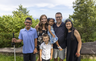 Landon, Jen, Hunter, Kinzley, Matt, and Brooklyn smiling and posing for the camera.