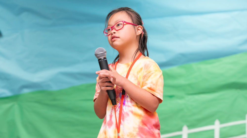 A girl holding a microphone