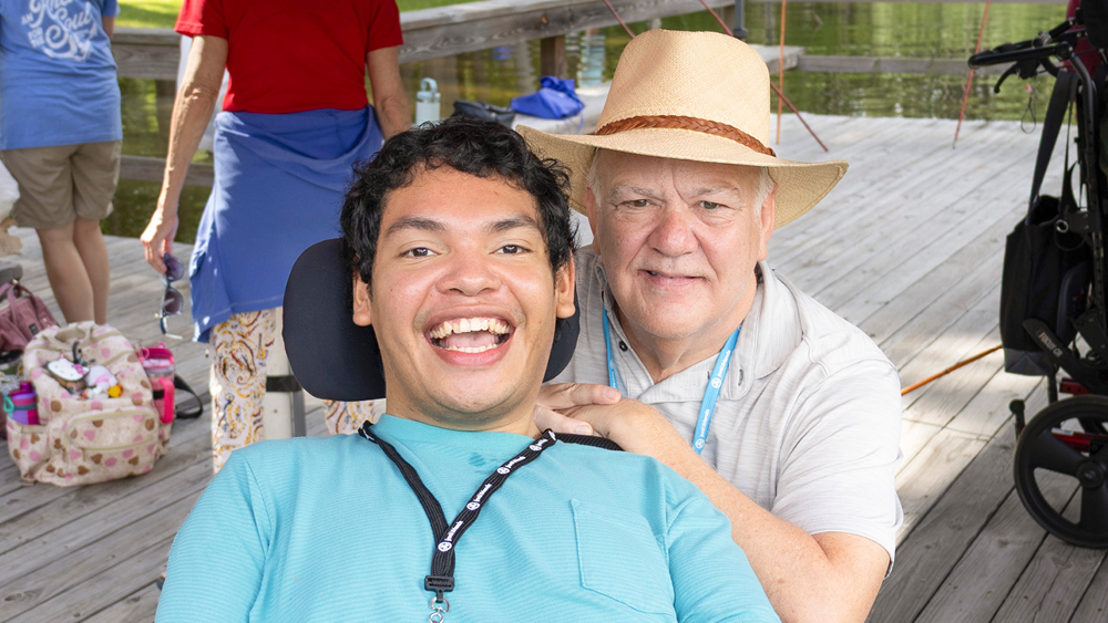 Campers pose for a photo at Family Retreat