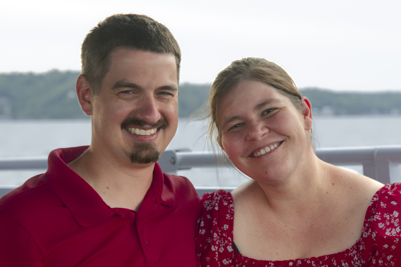 Jeremy and William smile beautifully at the Parent Dinner during the Family Retreat.