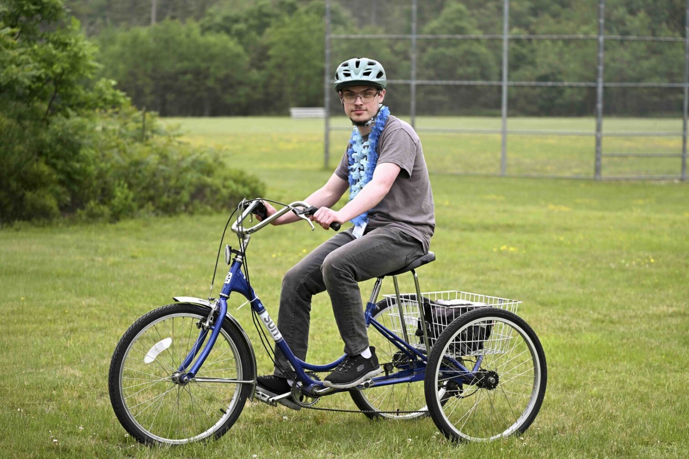 Joshua riding a bike.