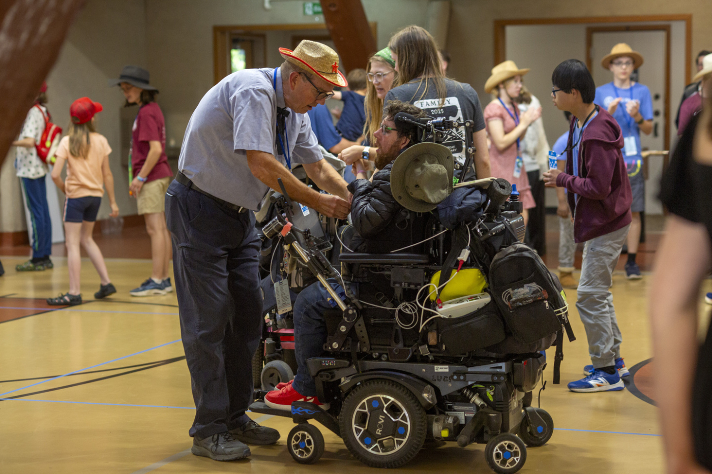 Alex with his buddy assisting him.