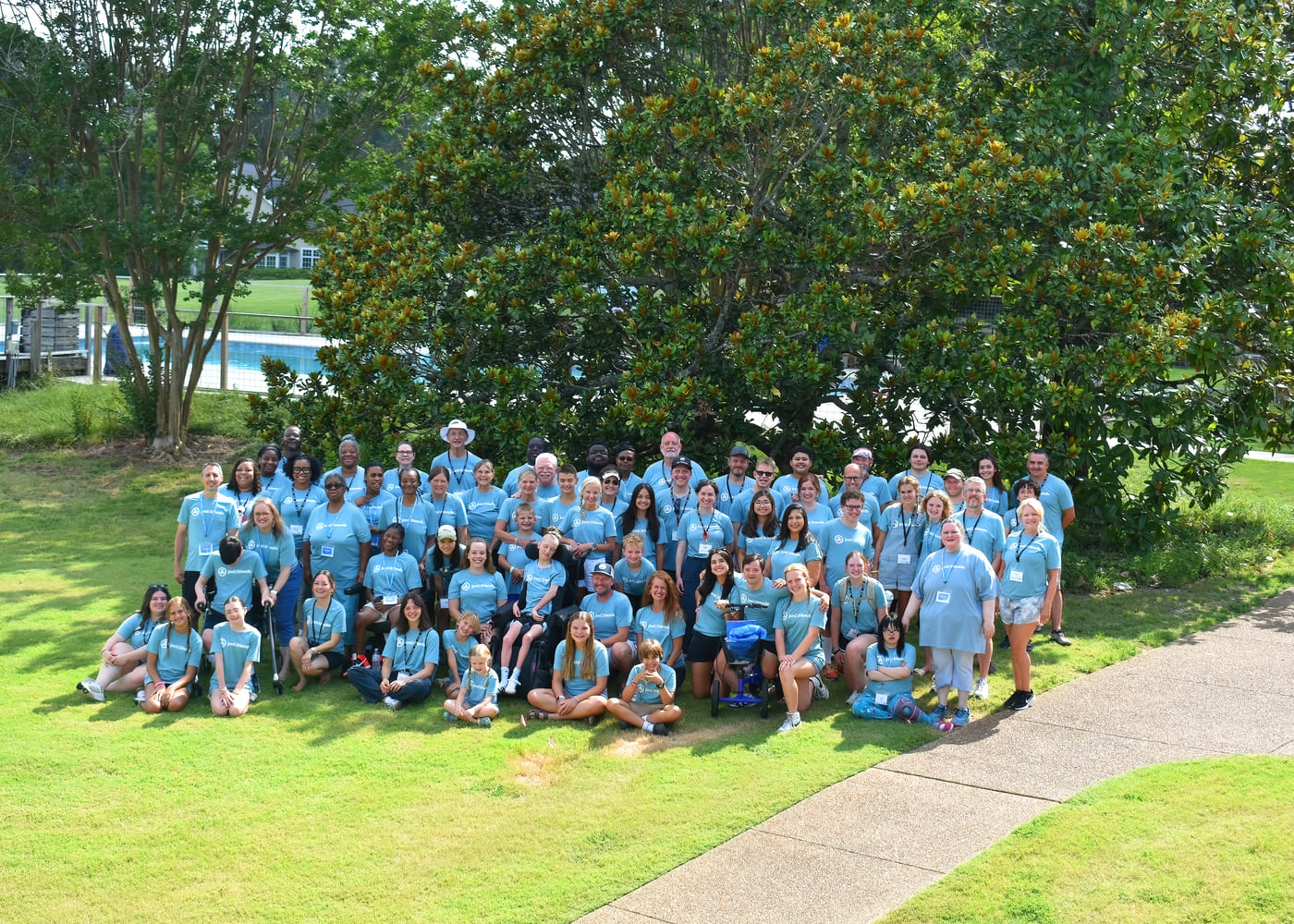A group photo of the Joni and Friends families who attended Family Retreat, together with the volunteers, including Jennifer and her daughters, Maddie and Yan.