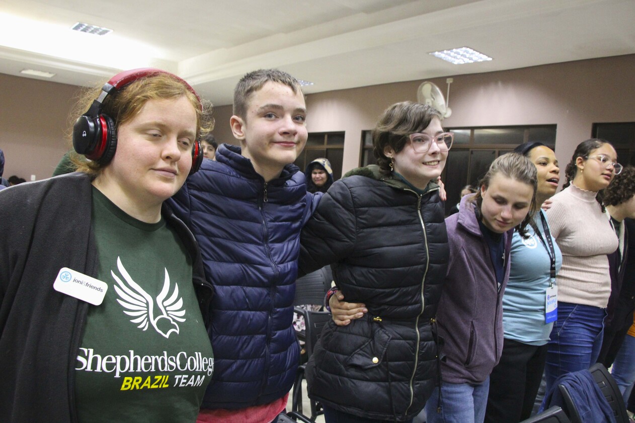 Shepherds College interns singing together.