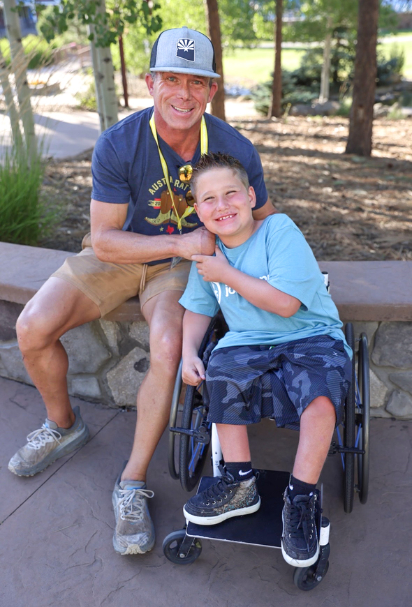 Conrad poses with his buddy Matt during Family Retreat at Lost Canyon Campgrounds.