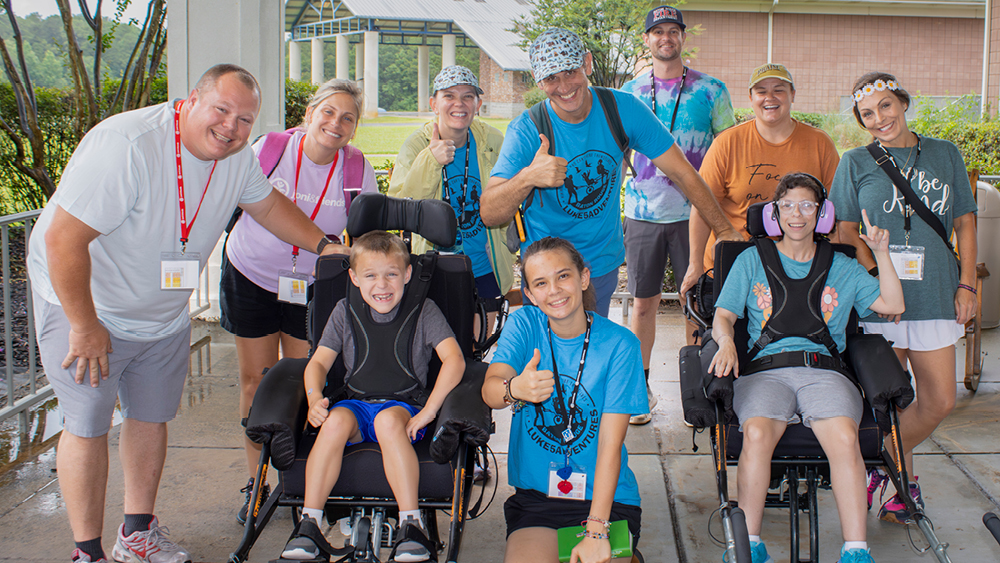 A group of people pose for a photo