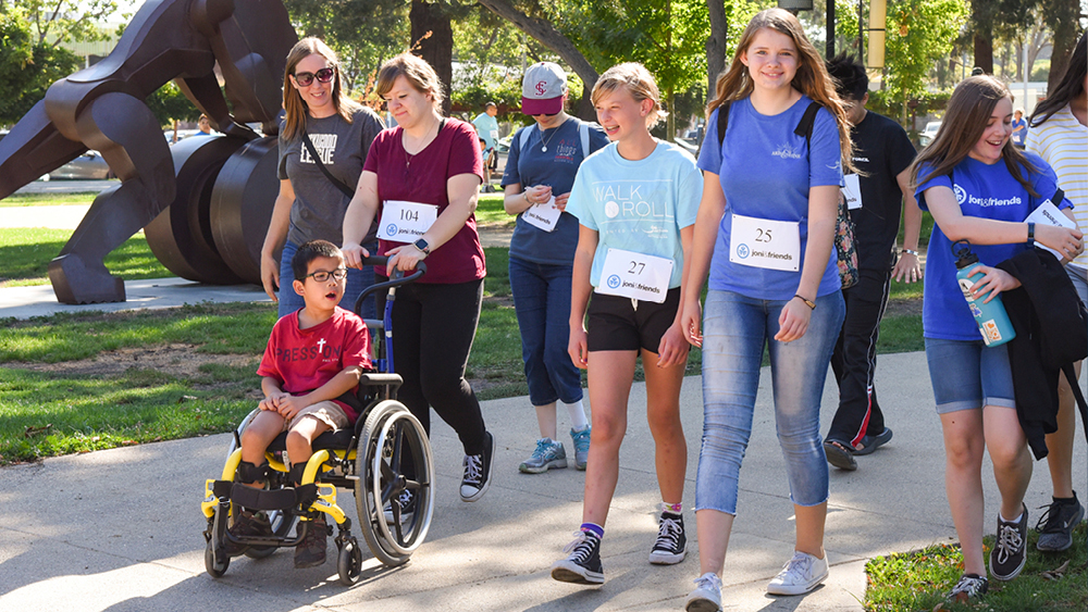 People on a Walk 'N' Roll