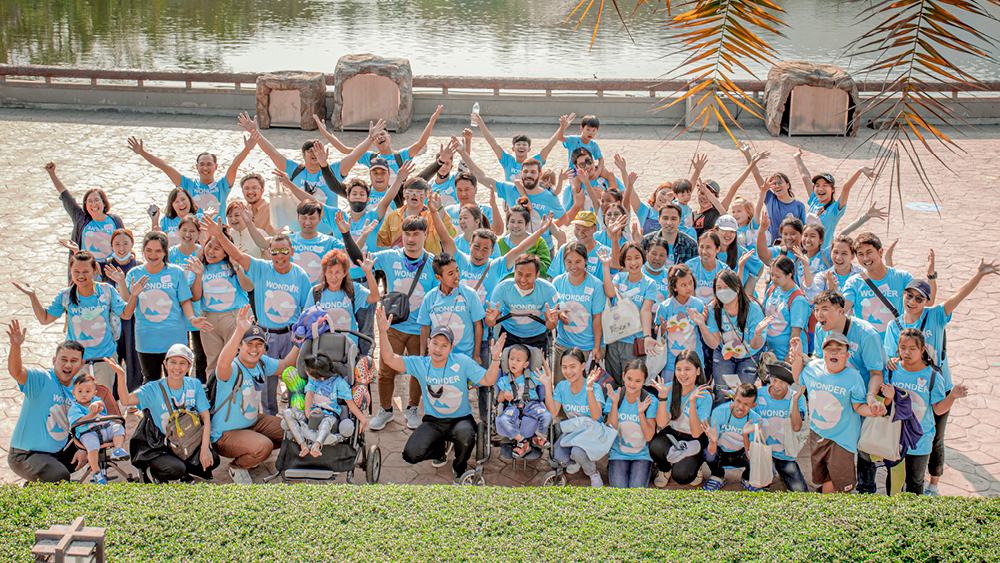 A group of volunteers pose for a photo