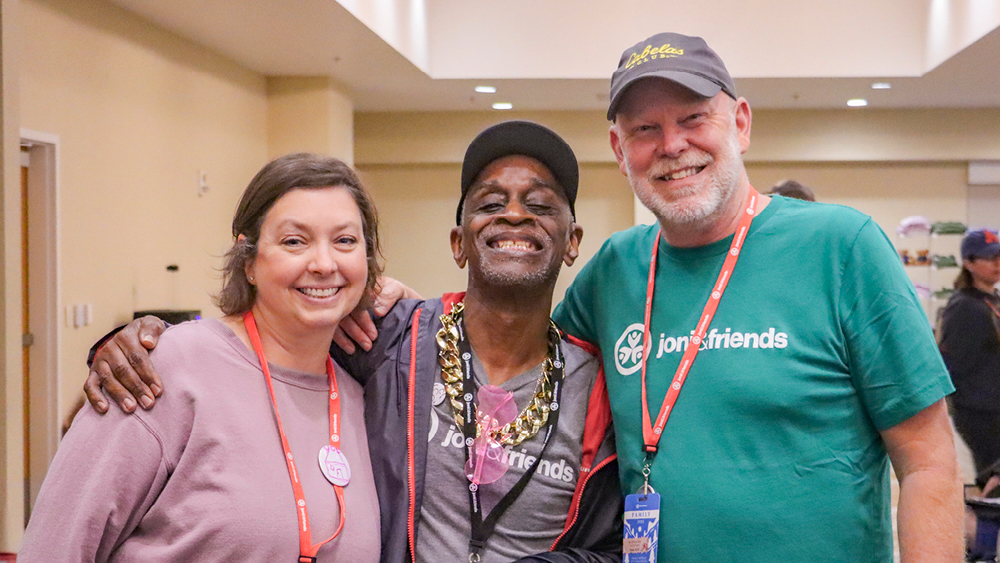 A group poses for a photo at a Joni and Friends event