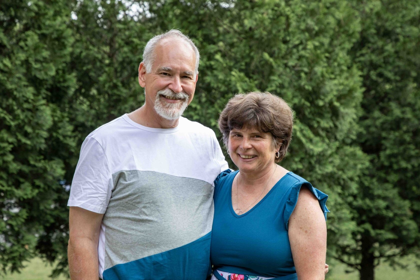 Ron and Joan smiling and posing for the camera.
