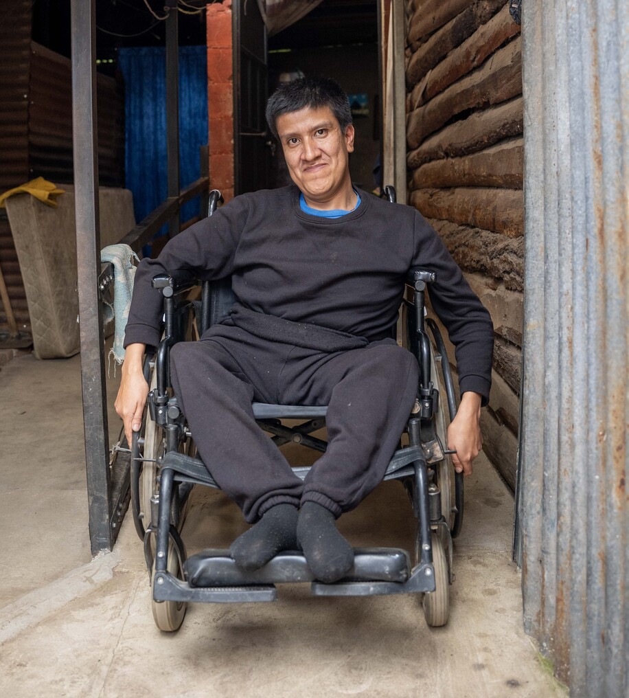 Javier smiles for the camera while in his new wheelchair.