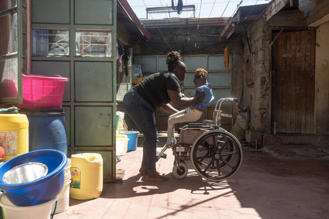 Elizabeth sits with Praise in her new wheelchair.