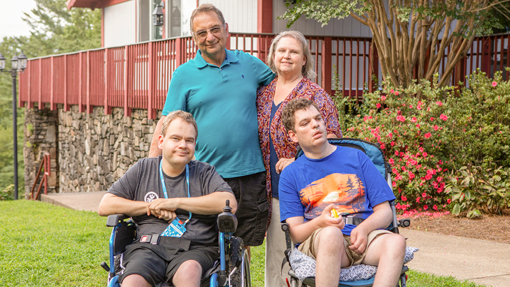 A family poses for a photo at Family Retreat