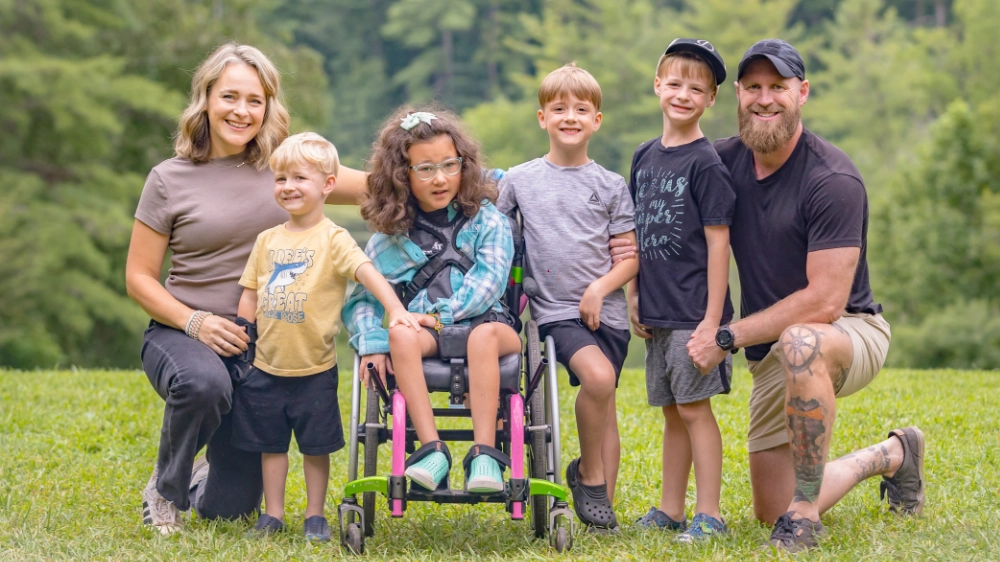 A family poses for a photo at Family Retreat