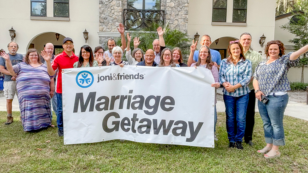Couples pose for a photo at a Marriage Getaway