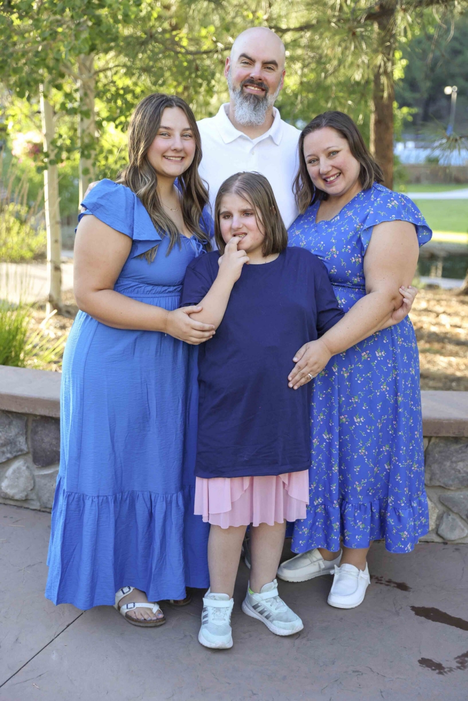 Dan, Brandi, Andi, and Savannah posing together for the camera.