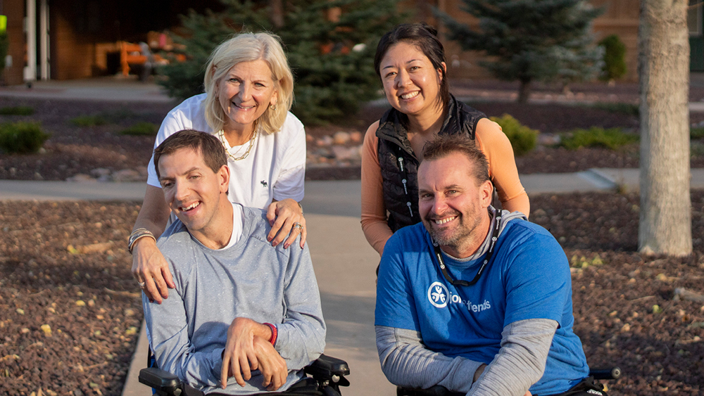 People pose for a photo at a Joni and Friends event