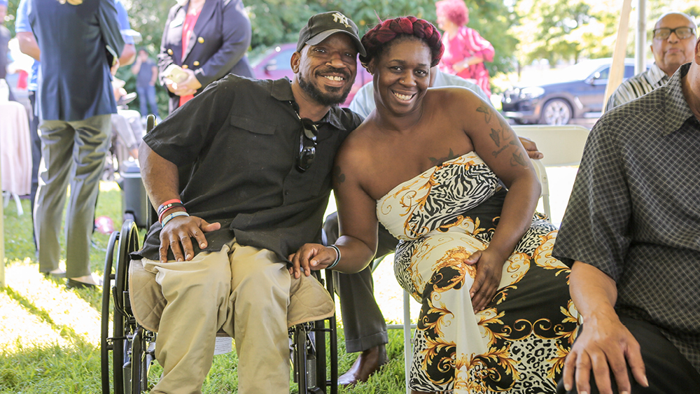 People pose for a photo at a Joni and Friends event