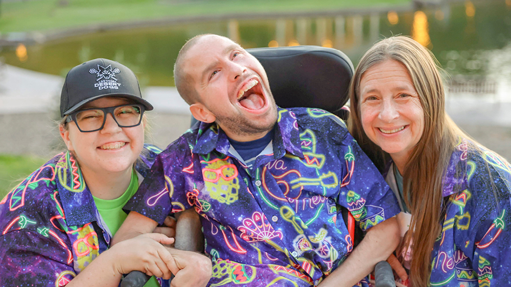 A group poses for a photo at a Joni and Friends event