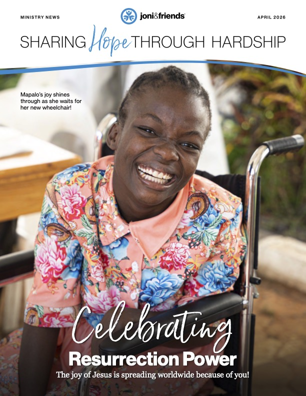 Mapalo's joy shines through as she waits for her new wheelchair!