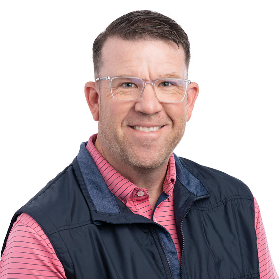A headshot of Connor Bales smiling for the camera.
