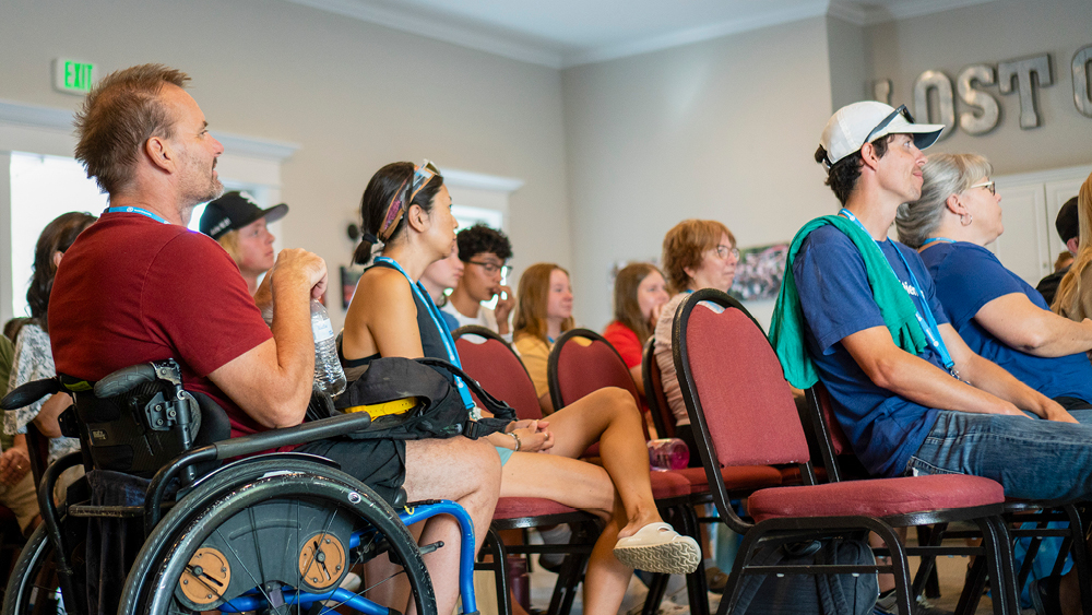 People sitting in a room during a conference