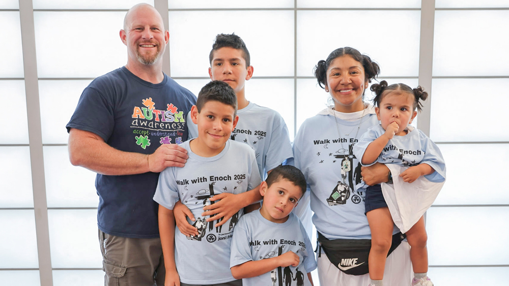 A family poses for a photo at a Joni and Friends event