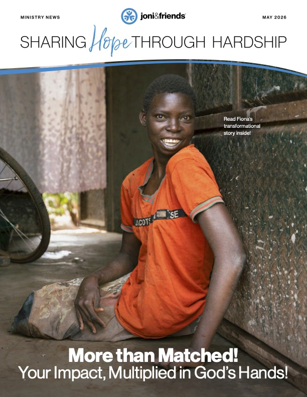 Newsletter cover featuring a woman sitting on the floor, smiling at the camera, with a bicycle nearby, with the text “Sharing Hope Through Hardship” above and “More Than Matched! Your Impact, Multiplied in God’s Hands!” below.