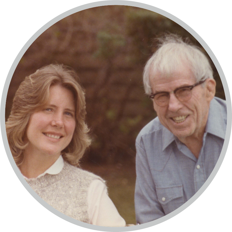 Joni and her dad both smiling and posing for the camera.