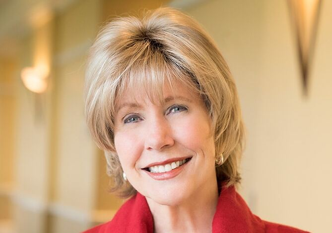 Joni Eareckson Tada smiling for the camera.